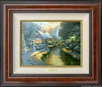 Frontal view of the framed canvas hung on wall showing complete burl frame, mat and painting.