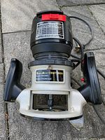 Top view of Craftsman router showing handles, body and speed control