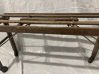 Photo showing close-up of maker's mark etched into wooden frame, identifying origin as Fergus, Canada.