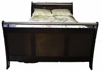 Front view of queen size contemporary sleigh bed frame with dark wood and metal accents, displaying no mattress or bedding included.