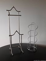 Full view showing both brushed nickel toilet roll caddy and upright caddy holder.