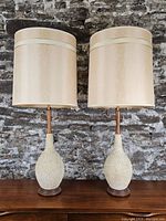 Front view of both lamps showing overall design, bases, and shades