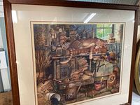 Rectangle print of cat lounging on a cluttered shelf of seeds and tools in wood frame