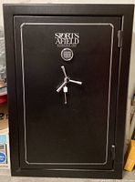 Front view of safe showing logo, keypad and handle