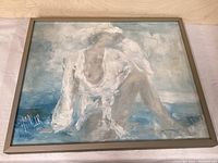 Framed impressionist style semi-nude painting of a woman at the beach, showing brushwork and color palette.