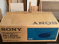 Cardboard box labeled Sony PS-LX520 Stereo Turntable System with product illustration
