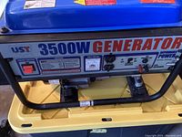 Front panel showing UST logo, 3500W label, voltmeter, two 120V AC outlets, on/off switch and circuit breaker.