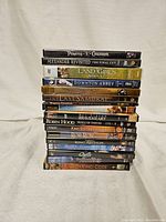 Stack of 17 DVDs with historical themes, showing titles and cover artwork.