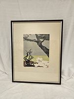 Front view of the framed Japanese print titled 'Carmel by the Sea' depicting a tree with branches and foliage in muted natural colors, matted and framed.