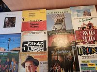Photo showing the front covers of most albums including Miles Davis' Sketches of Spain, The Limeliters, James Galway and The Chieftains, and the compilation Swing is the Thing
