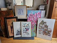 Overview of five framed artworks including bird prints, original colorful flower painting and Ontario bicentennial print.