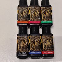 Six bottles of Diamine Fountain Pen Ink arranged in two rows of three, showing all color-coded labels.