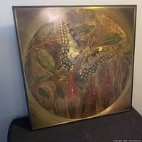 Full view of square vintage metal picture with butterfly and floral design, showing the entire artwork and frame.