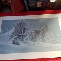 Full view of the print showing a wolf in a snowy forest near a tree stump, featuring winter landscape details.