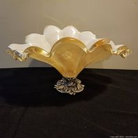 Front view of the vintage Murano glass pedestal dish showing scalloped edges and gold accents.