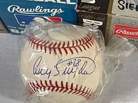 Autographed baseball with Corey Snyder signature in plastic bag