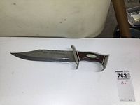 Full view of True Edge Canada hunting knife showing blade and handle.