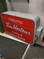 Front view of sign showing red graphic panel