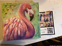 Image of square flamingo artwork in pink tones with a green and heart-shaped background, original Joanne Kells painting.