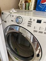 Front view showing full door, control knob, and overall unit condition