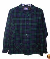 Front view of vintage green and navy blue plaid Pendleton Wood 49er shirt jacket, size XL, showing button closure and two front pockets.