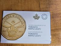 Front cover of the coin set packaging showing the commemorative coin design for the 100th anniversary of the Toronto Maple Leafs 1917-2017