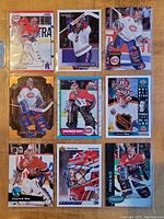 Nine hockey cards featuring Patrick Roy in various poses and designs, including standard and special edition cards.