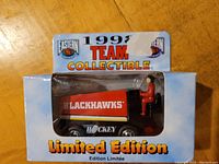 Front view of Chicago Blackhawks die cast Zamboni in original blue box with clear window, labeled limited edition 1993 team collectible.