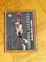 Front side of 1992-93 Michael Jordan Upper Deck Season Leaders Scoring basketball card in protective plastic case.