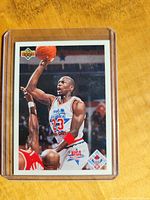 Michael Jordan basketball trading card in Team USA uniform with number 23, Upper Deck brand.