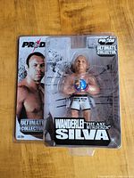 Full view of the unopened Wanderlei Silva figure with packaging showing branding and photo of the fighter.
