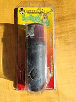 Front view of Quaker Boy Squeezin Bleat Deer Call in original blister packaging with visible product and branding.