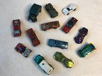 All 13 cars arranged on cloth