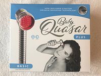 Front view of original Baby Quasar Plus Basic box showing product name, wrinkle reducing technology with C-Factor, and image of woman using the device on her face.