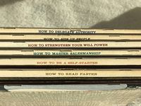 Top view of the six books showing their titles on the spine.