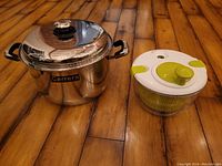 Photo showing the Carrera commercial pot and salad spinner on wooden floor