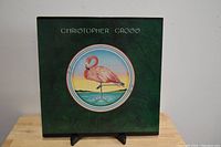 Front cover of Christopher Cross vinyl LP album with flamingo artwork.