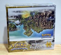 Front view of sealed Pokemon Johto Puzzle box showing artwork and piece count