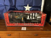 Front view of unopened boxed 1:18 scale P-47D Thunderbolt Razor-Back Blonde Angel model with pilot figure and flame themed packaging.