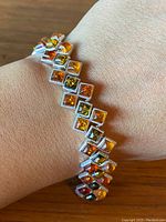 Bracelet worn on wrist showing pattern and size