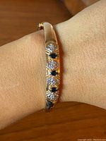 Bracelet worn on wrist showing overall fit and appearance.