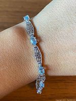 Full view of bracelet worn on wrist showing overall length and fit