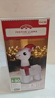 Box for the Holiday Time Festive Llama inflatable showing the product image and measurement (3.5 ft tall). The box is in good shape with a $14.98 price sticker.