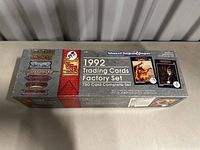 Box of 1992 Advanced Dungeons & Dragons Trading Card Factory Set featuring logos and game setting names.