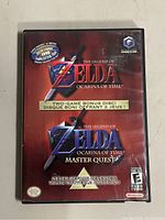 Front cover of The Legend of Zelda: Ocarina of Time Master Quest for Nintendo GameCube showing two-game bonus disc sticker and game art.