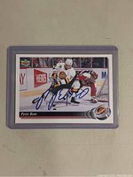 Front of the card showing player image and autograph