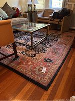 Full view of the rug under coffee table and surrounding chairs