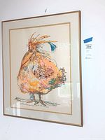 Full view of the framed watercolor and ink rooster painting on wall, showing overall size and framing.