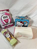 Photo showing all four Hello Kitty and Disney Princess themed items laid against white backdrop.