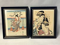 Both framed Japanese woodblock prints side by side showing overall appearance and size
